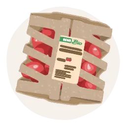 Eine REWE Papiertüte voll unterschiedlicher Produkte. 