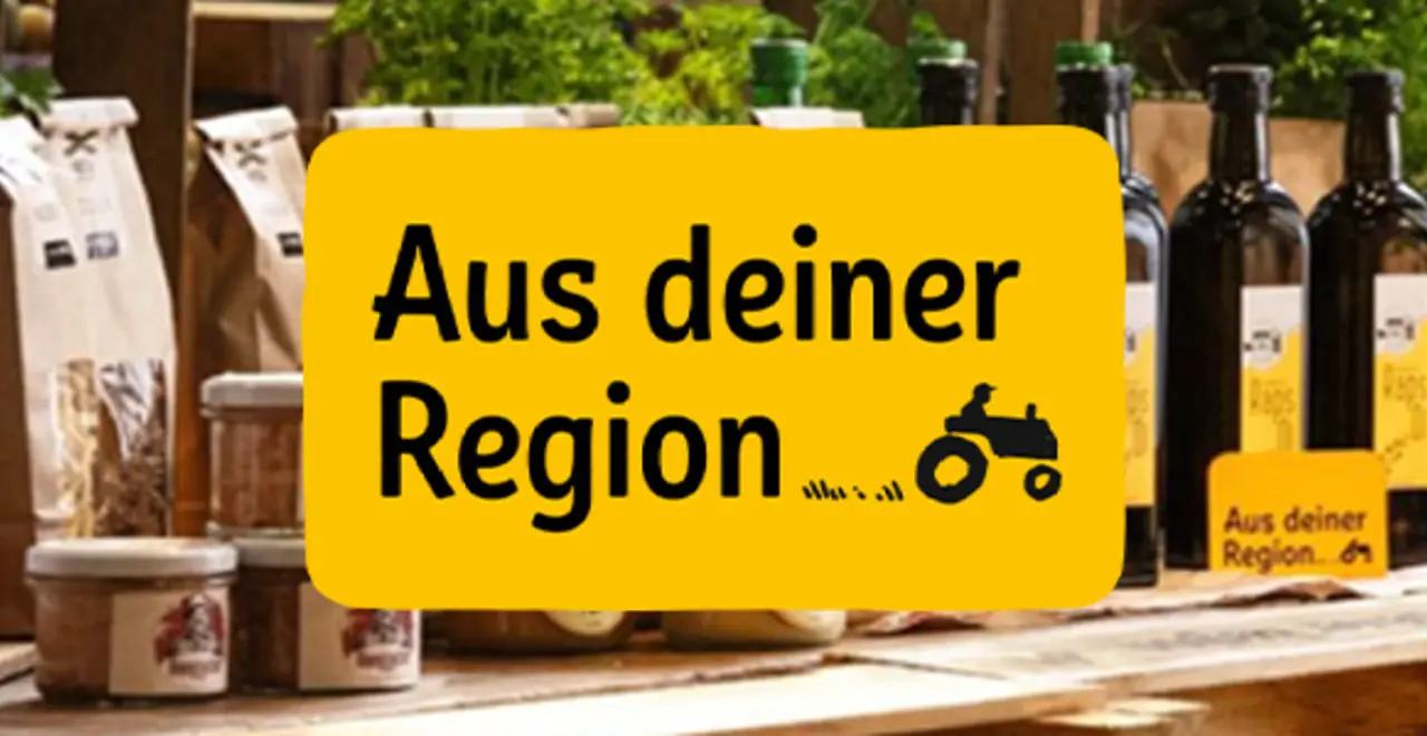 Gelbes Logo mit der Aufschrift "Aus deiner Region"