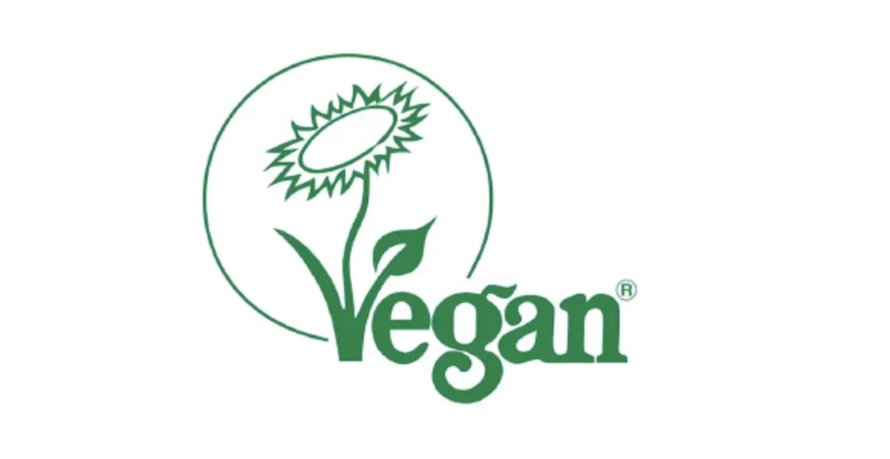 Das Label „Gütesiegel Veganblume“.