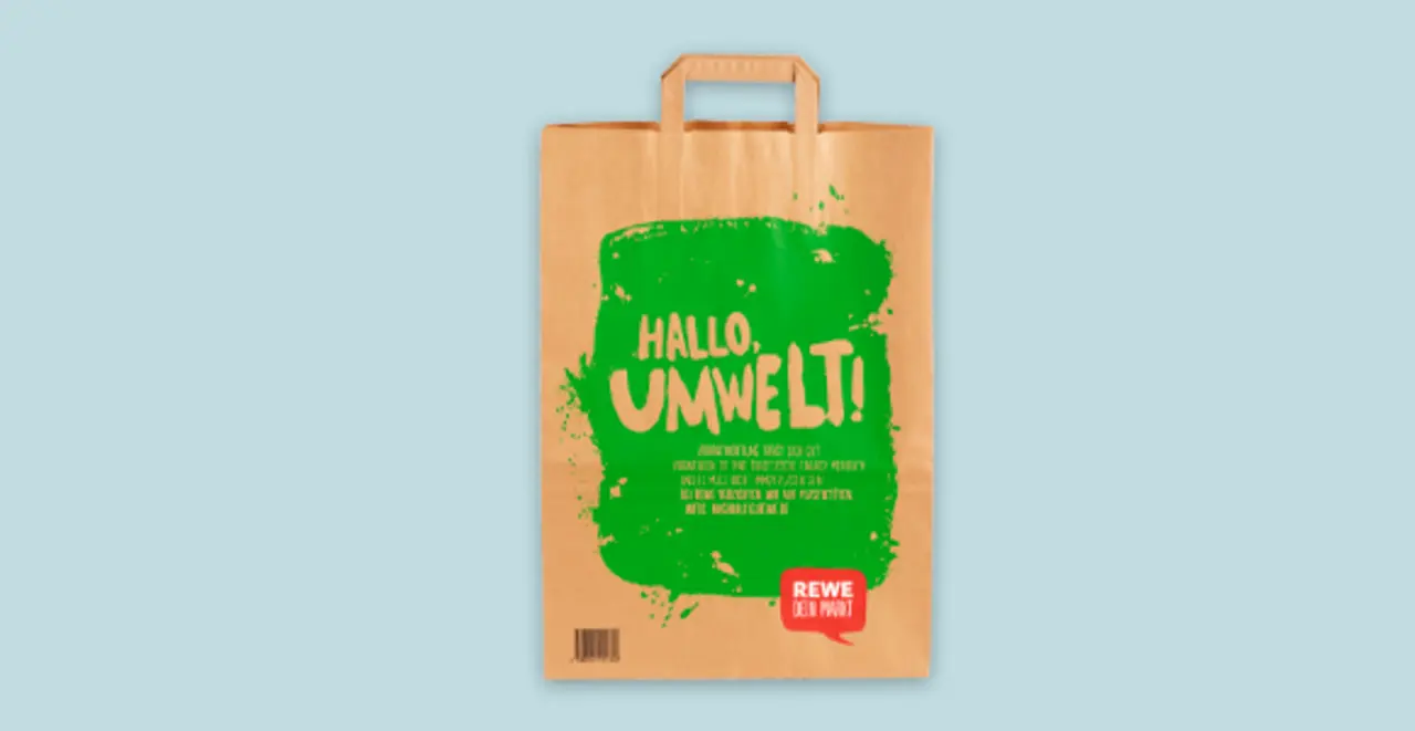 Eine REWE Papiertüte.